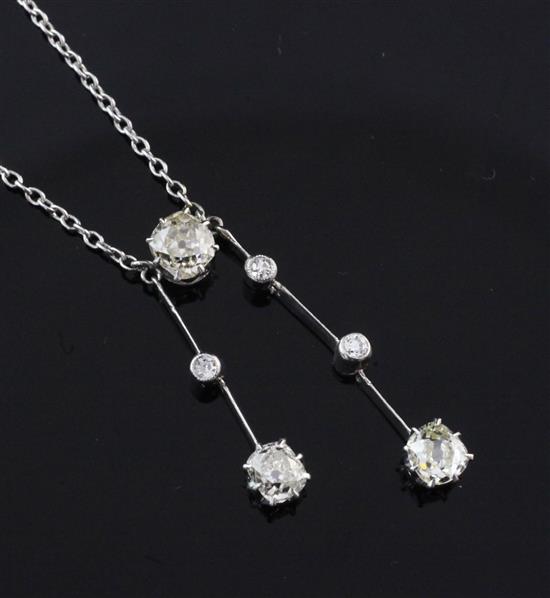 A 1920s platinum and diamond drop pendant necklace, drop 1.25in.